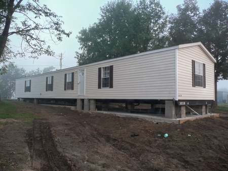 Single-wide: on slab, ready for siding